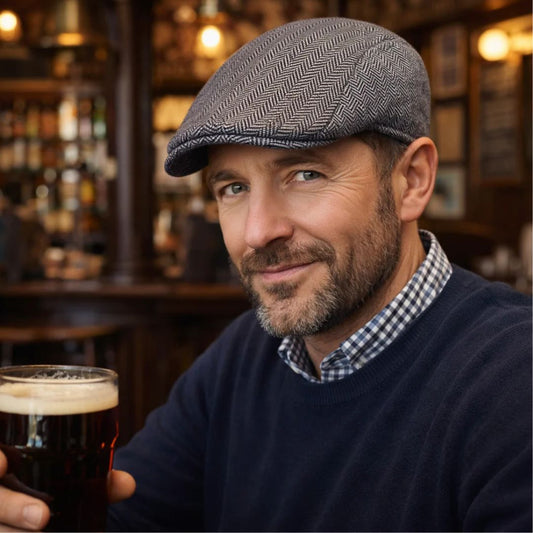 Man in flat cap in pub 
